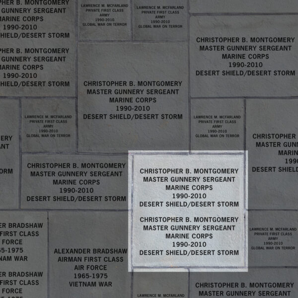 Image indicating two veterans recognized on a 23x23 inch paver. It demonstrates that the paver includes the veterans' name, rank, branch of service, years of service and theaters in which they served.