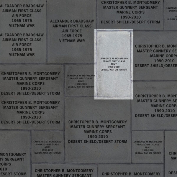 Image indicating a single veteran recognized on a 11x23 inch paver. It demonstrates that the paver includes the veteran's name, rank, branch of service, years of service and theaters in which they served.